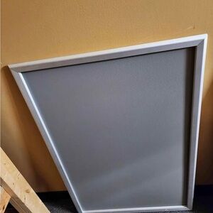 White Framed Gray Notice Board